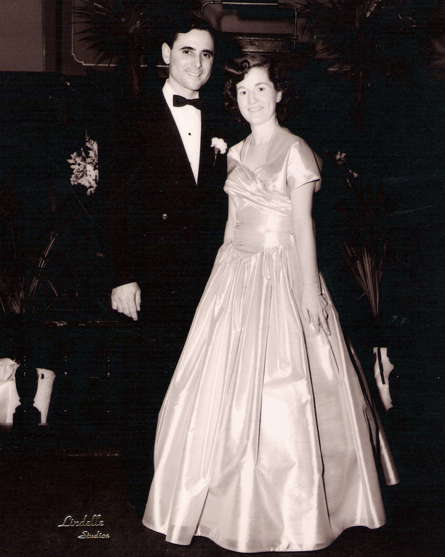 Hank and Anna dressed up for a wedding.